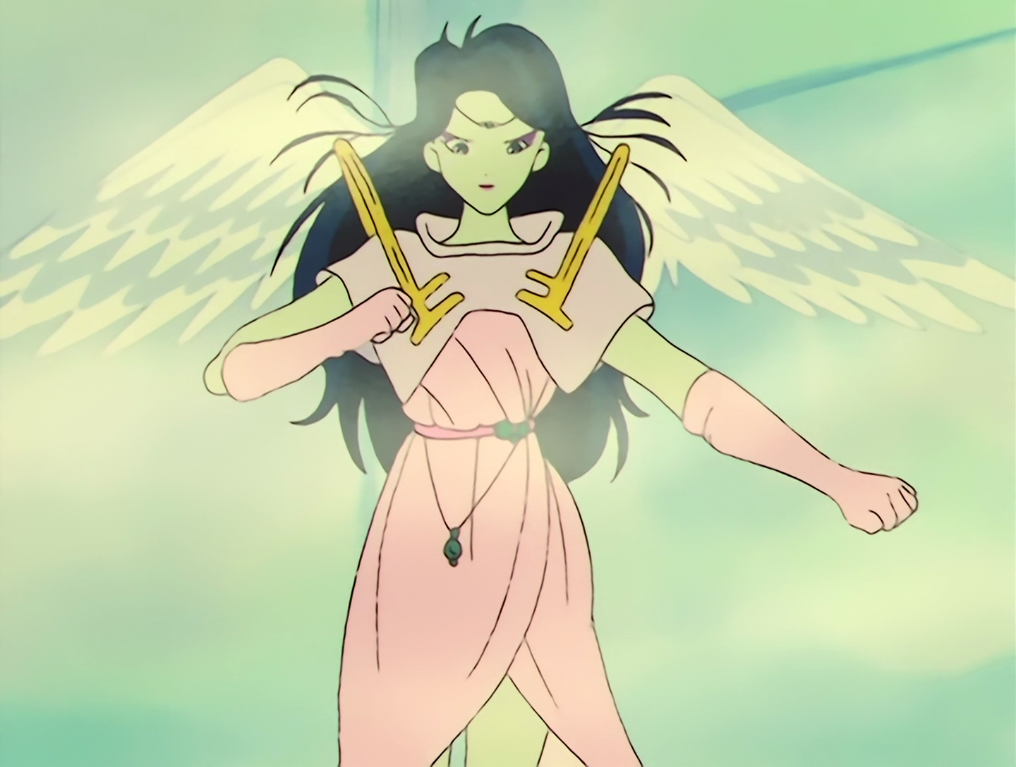 Binah, a Youma from Sailor Moon episode 28. She has pale green skin and long black hair. She has large white angel wings, and her outfit is pink and lilac, with golden half-loops over each shoulder. This design is pleasant enough but I’d have preferred a flaming wheel covered in eyes, or something like that.